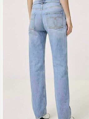Authentic CHANEL Light Blue High-Rise Denim Jeans with Gold CC Button